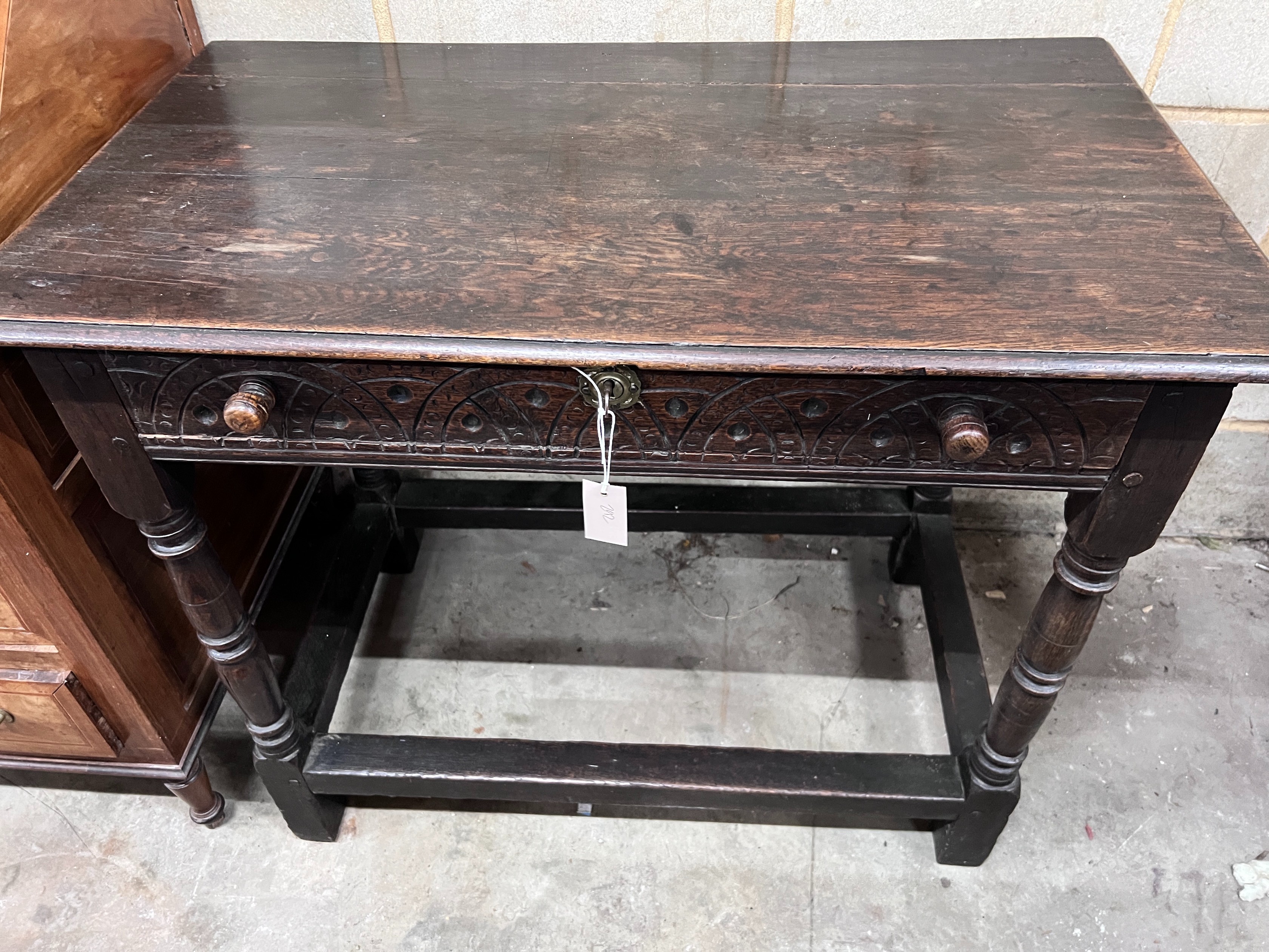 A 17th century style oak side table, width 100cm *Please note the sale commences at 9am.
